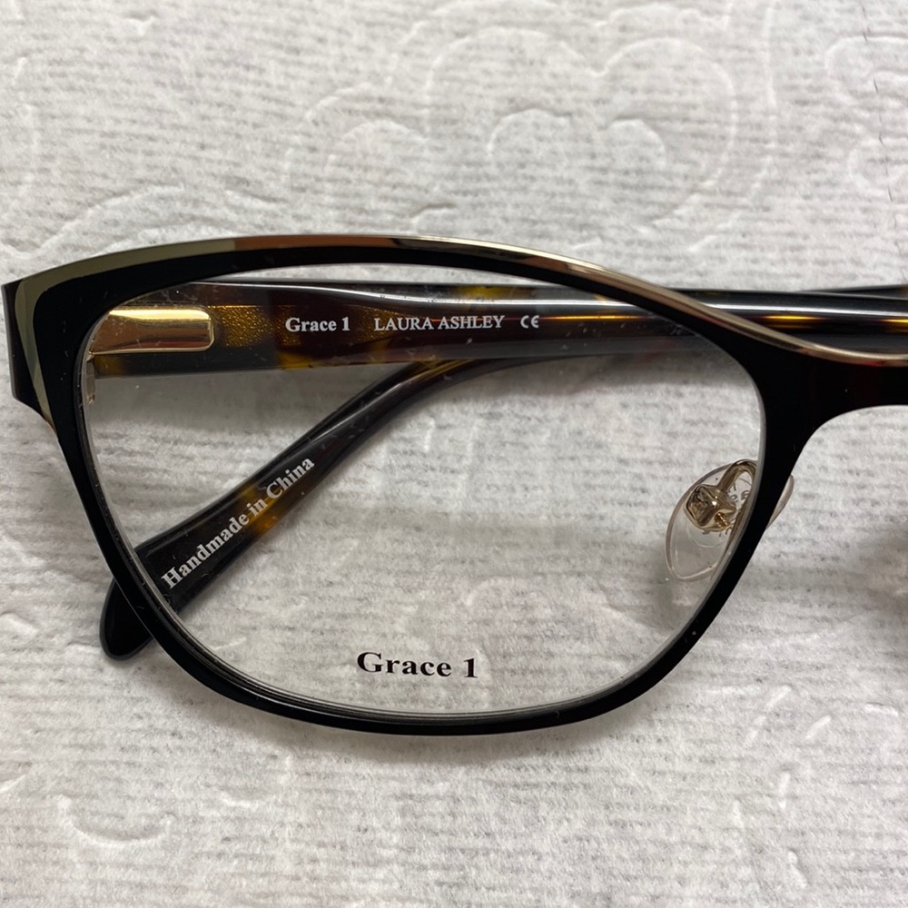 Laura Ashley Eyeglasses Black and Gold frame with tortoiseshell temples
